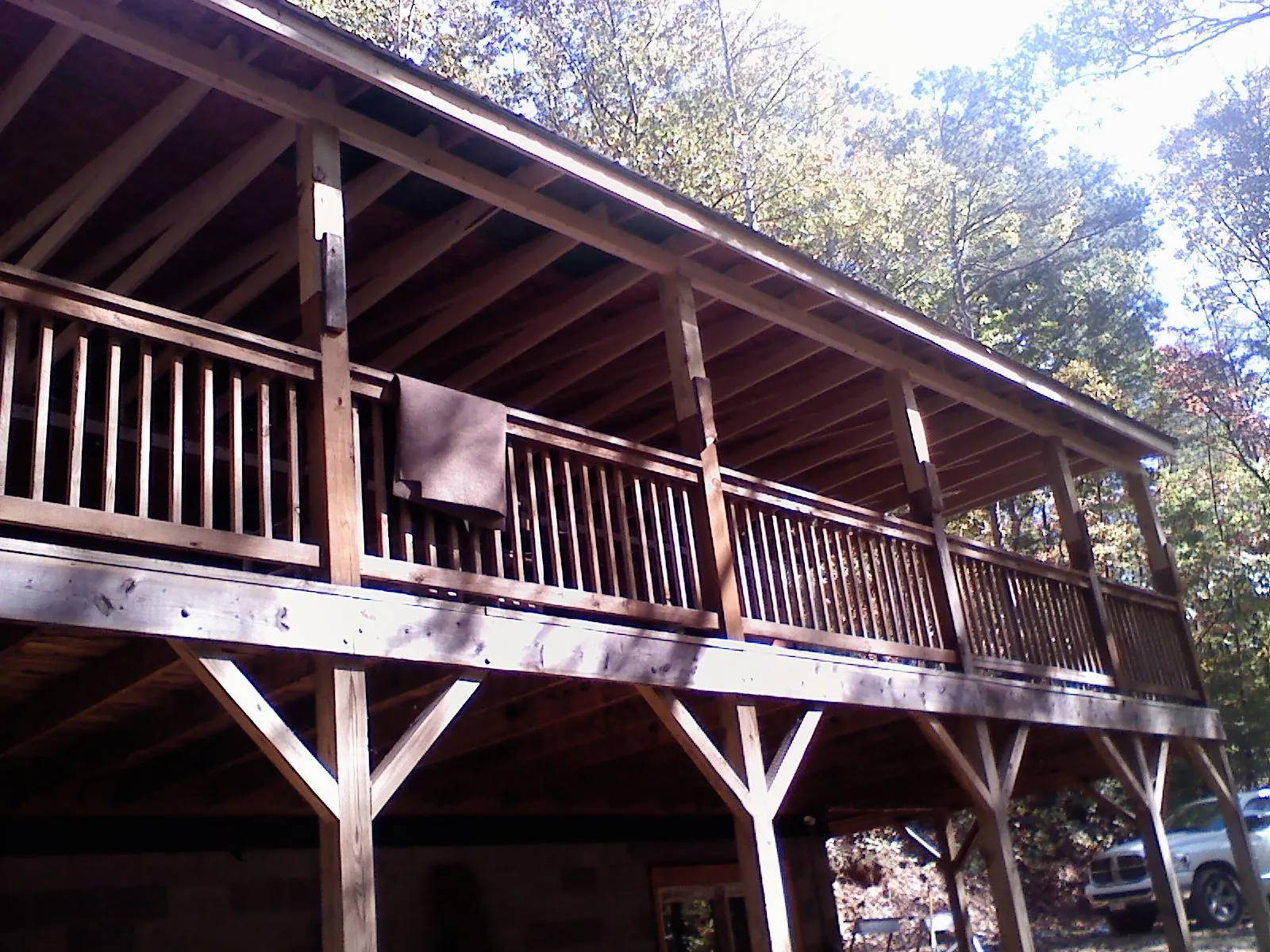 Timber framing under a new elevated porch and deck — Roof Leak Repair in Kenneth by Roofing Brothers